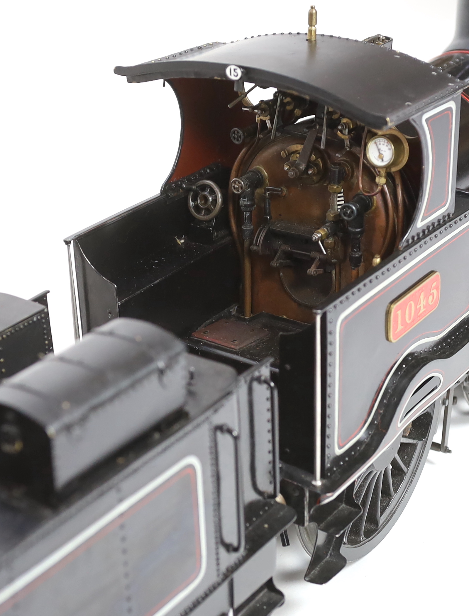 A very finely engineered scratch-built 5” gauge live steam model of a LNWR (London and North Western Railway) Jumbo 2-4-0 tender locomotive, No. 1045 ‘Whitworth’